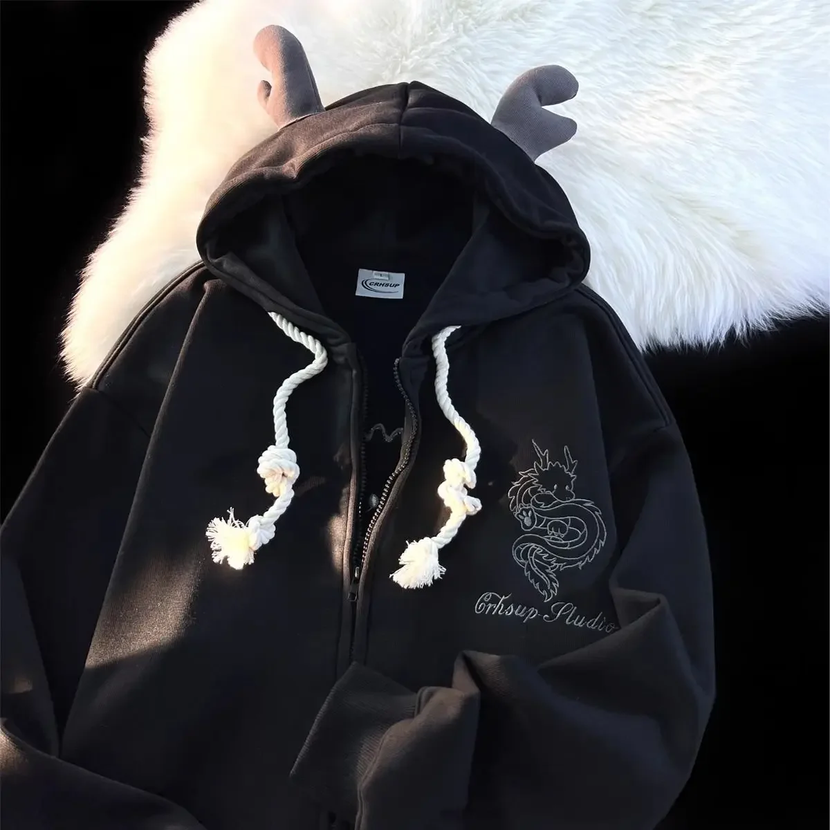 Dragon embroidered hoodie with horns