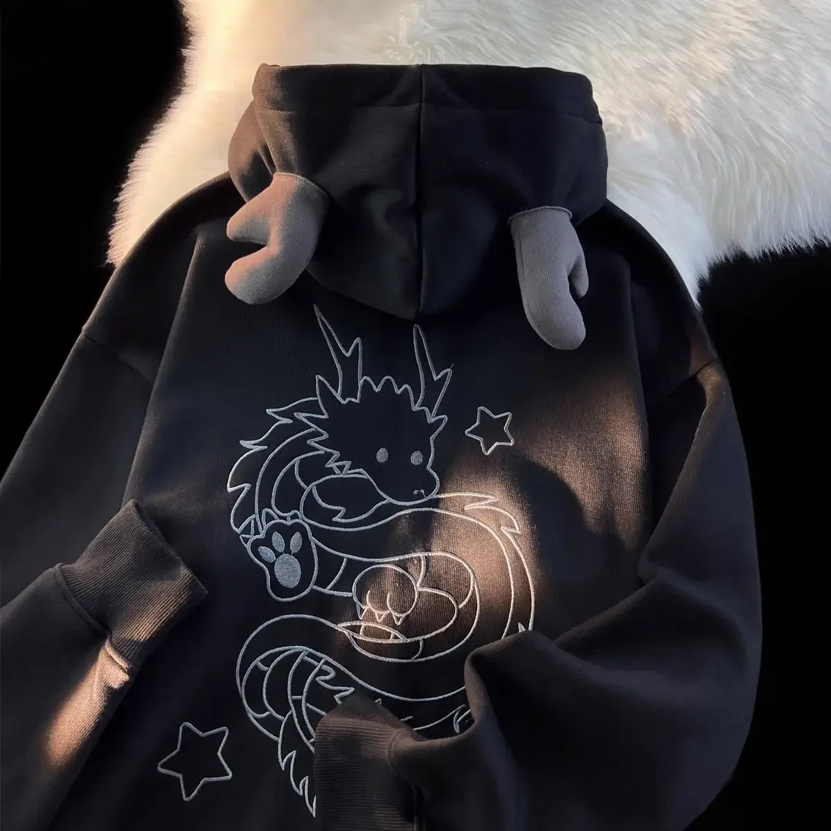 Dragon embroidered hoodie with horns