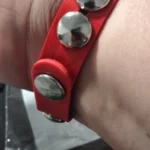 Red wristbands with spikes and rivets photo review