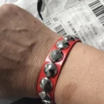 Red wristbands with spikes and rivets photo review